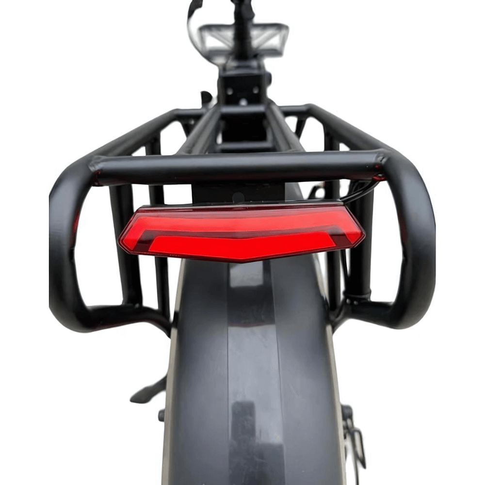 Close up of the red rear reflector, rear rack and fender of the Kristall Y20 fat tyre ebike