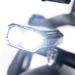 Load image into Gallery viewer, Zoomed in glowing headlight of Kristall Y20 ebike
